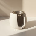 White Round Porcelain Wax Melt Burner on beige surface